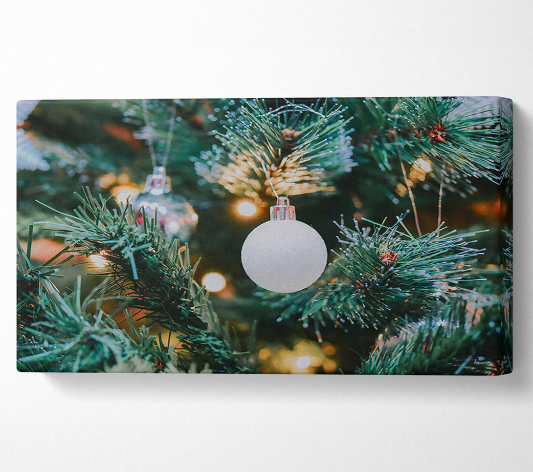  A Canvas Print of White Ornament On Green Tree Canvas Wall Art