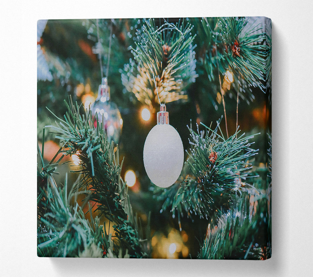  A Canvas Print of White Ornament On Green Tree Canvas Wall Art