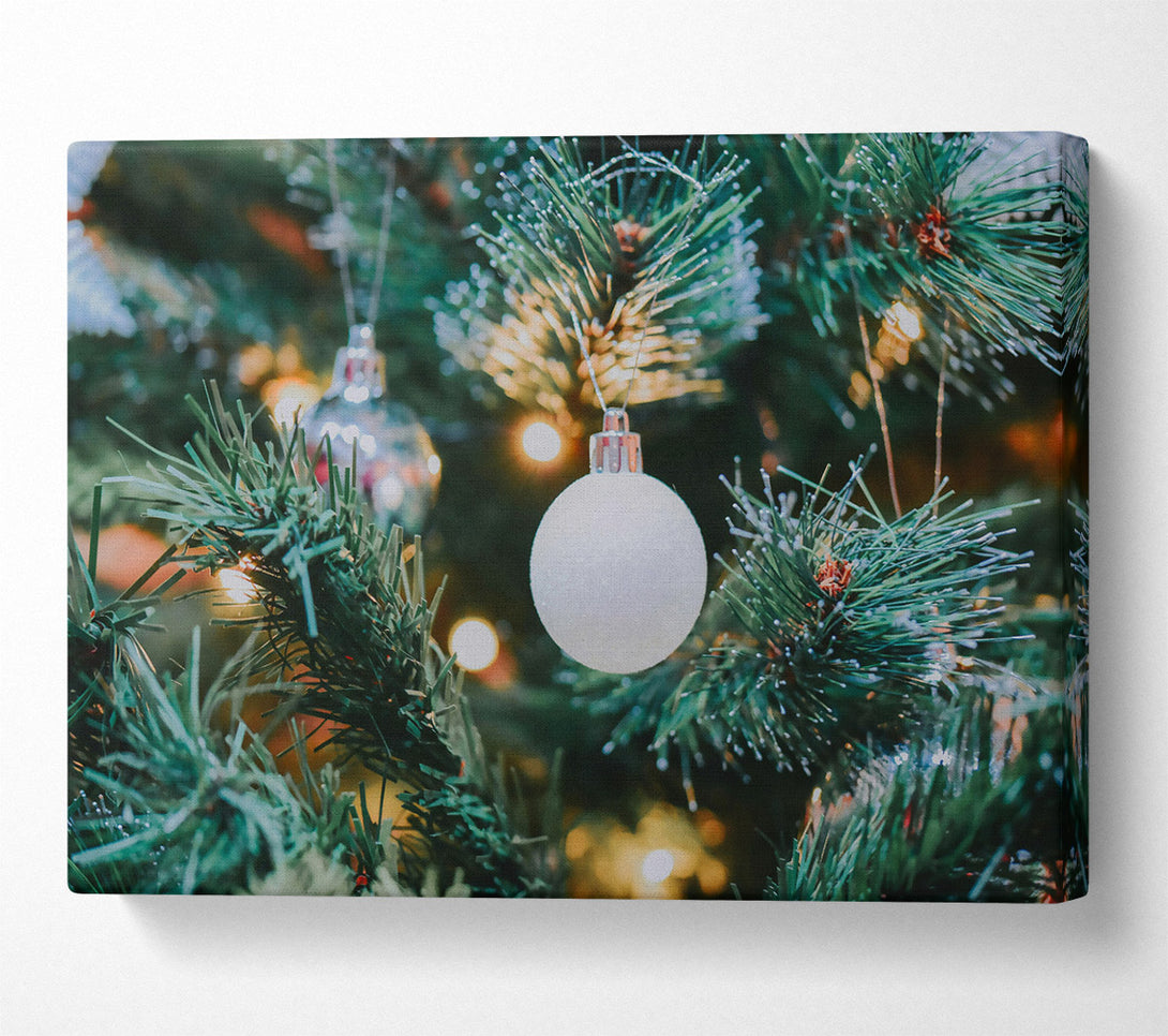  A Canvas Print of White Ornament On Green Tree Canvas Wall Art