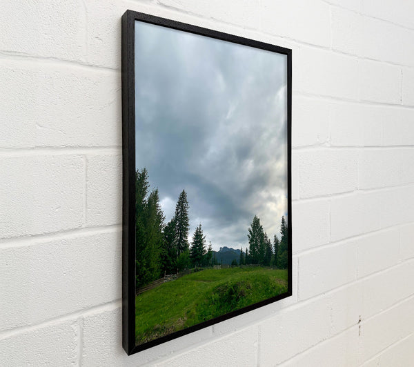 Gray Clouds Over Green Hills