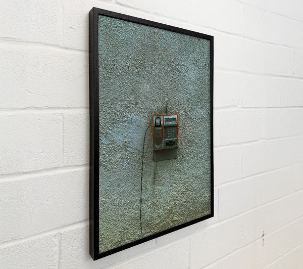 Orange Phone On Wall