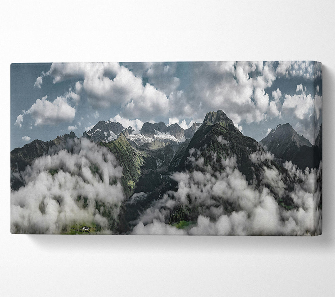  A Canvas Print of White Peaks In Green Valley. Canvas Art