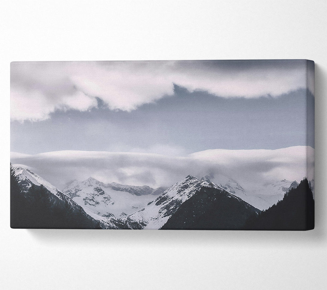  A Canvas Print of White Peaks Under Grey Canvas Print