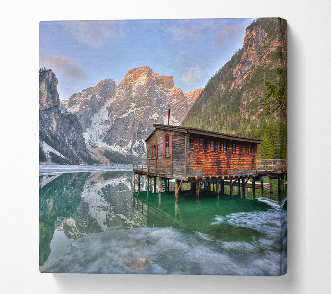  A Canvas Print of Green Cabin Reflects Mountains Canvas Print