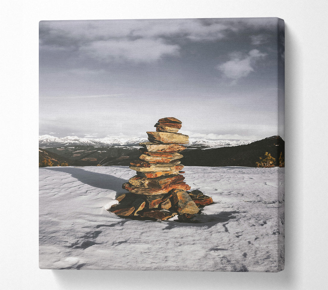  A Canvas Print of Red Stone Cairn In Snow Canvas Art