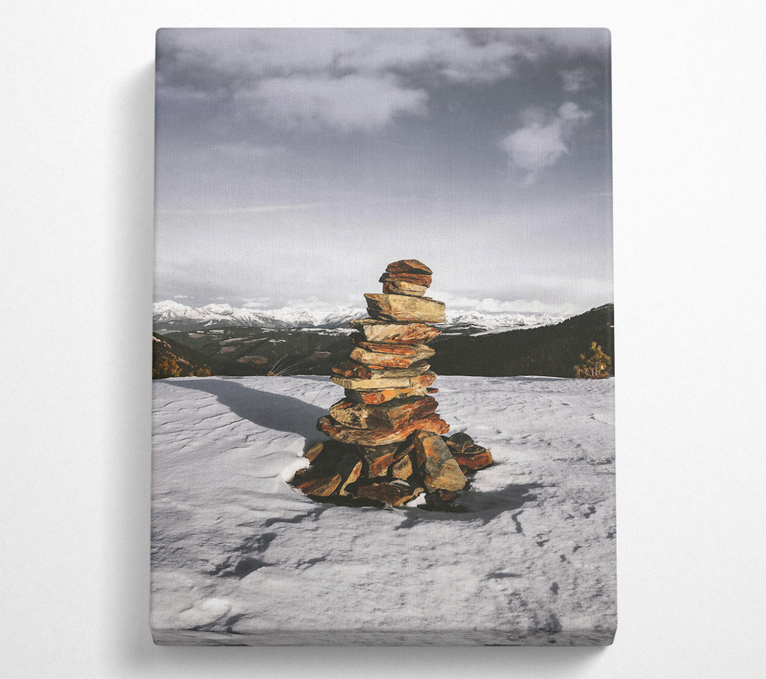  A Canvas Print of Red Stone Cairn In Snow Canvas Art