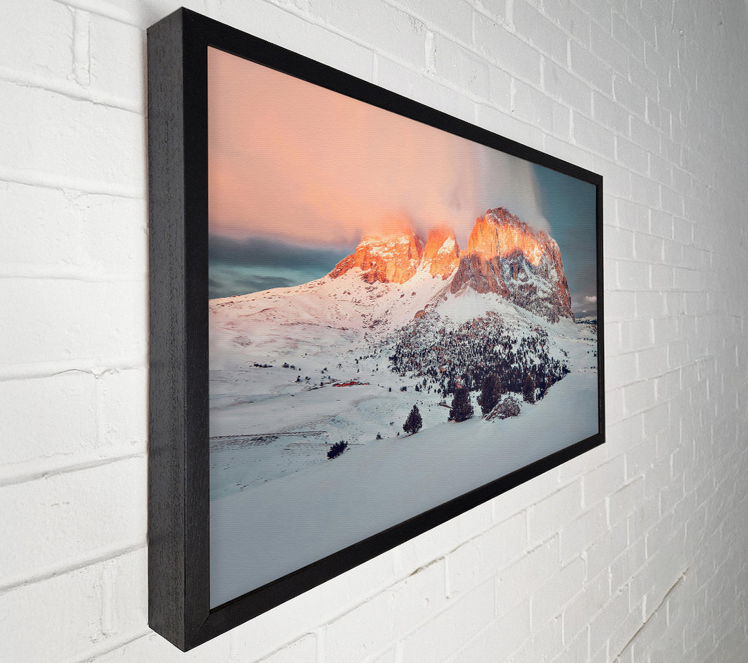  A Canvas Print of Orange Glow On Snow Peaks Canvas Print