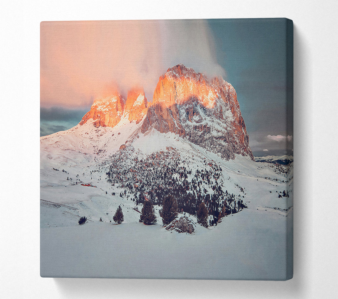  A Canvas Print of Orange Glow On Snow Peaks Canvas Print