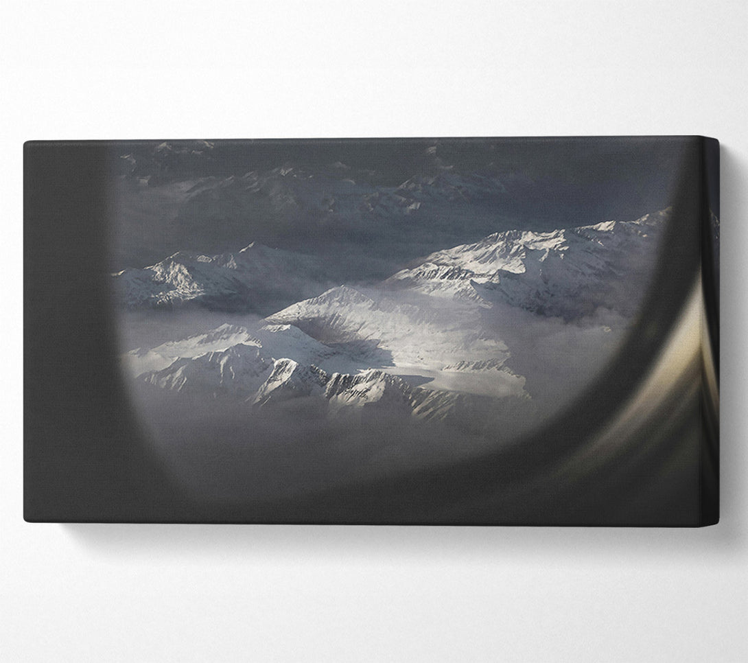  A Canvas Print of White Peaks Through Glass Canvas Print