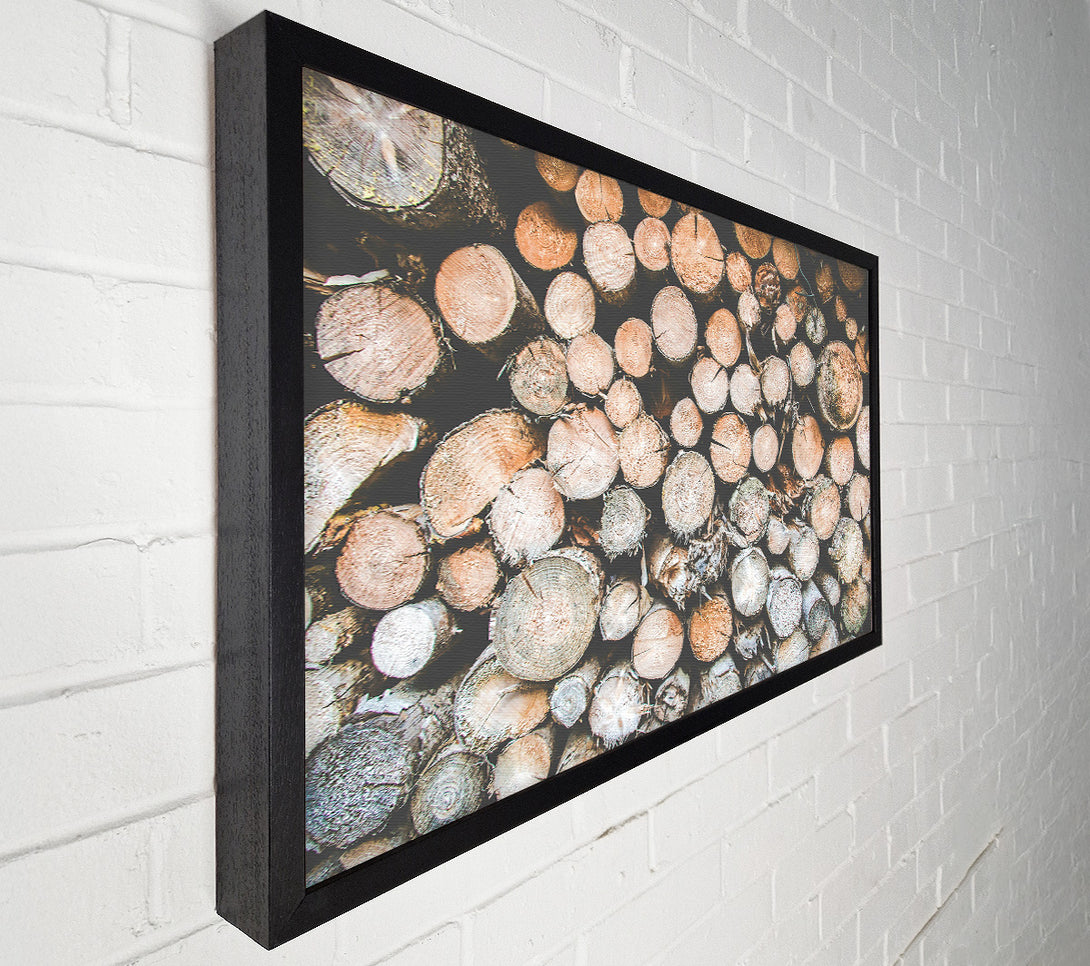  A Canvas Print of Stacked Brown Logs Canvas Art