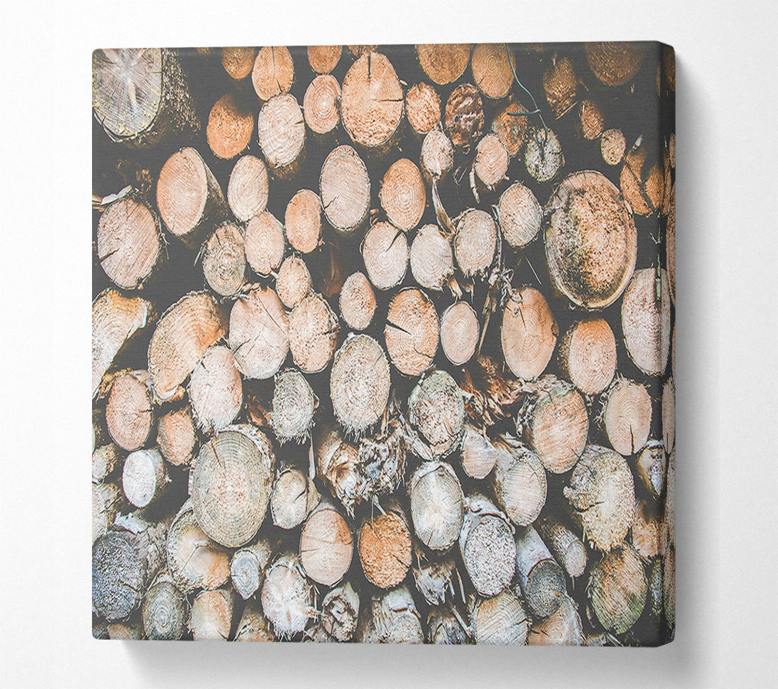  A Canvas Print of Stacked Brown Logs Canvas Art