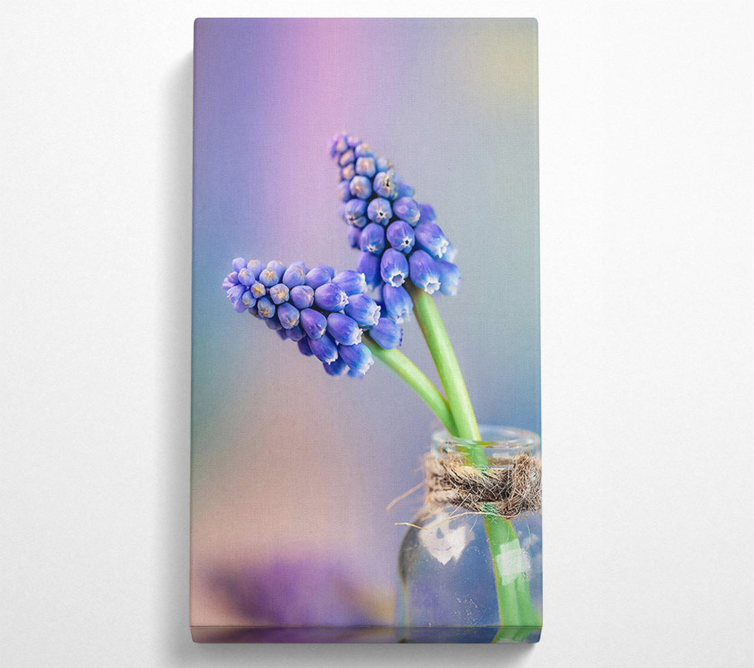  A Canvas Print of Blue Blooms In Glass Canvas Print