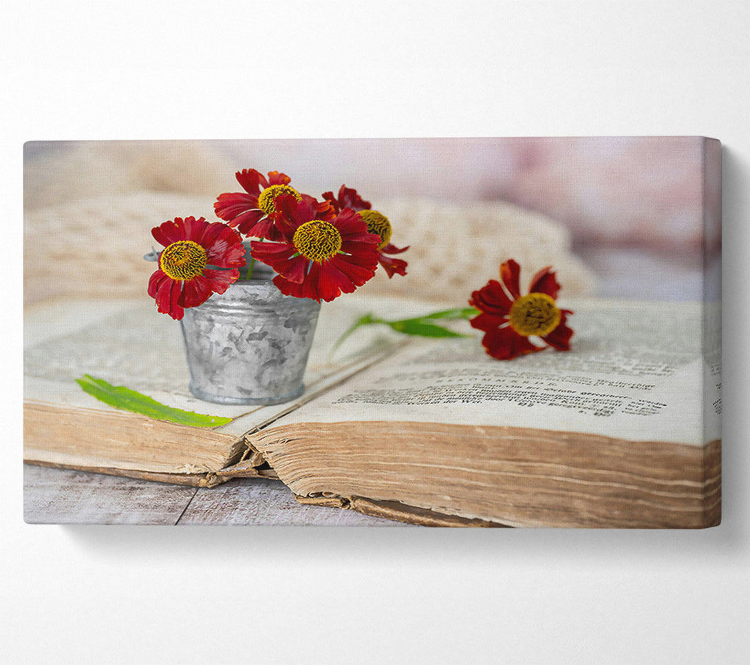  A Canvas Print of Crimson Blooms On Old Book Canvas Wall Art