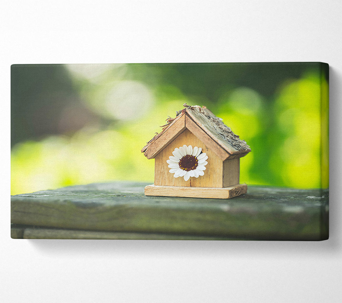  A Canvas Print of White Flower Birdhouse Canvas Print