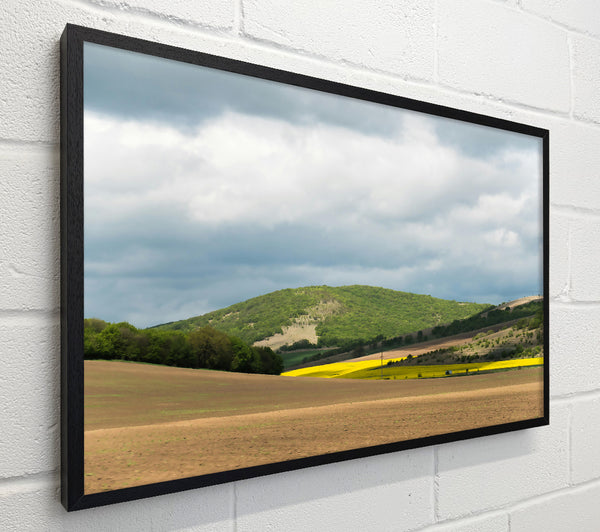 Golden Hills Under Clouds