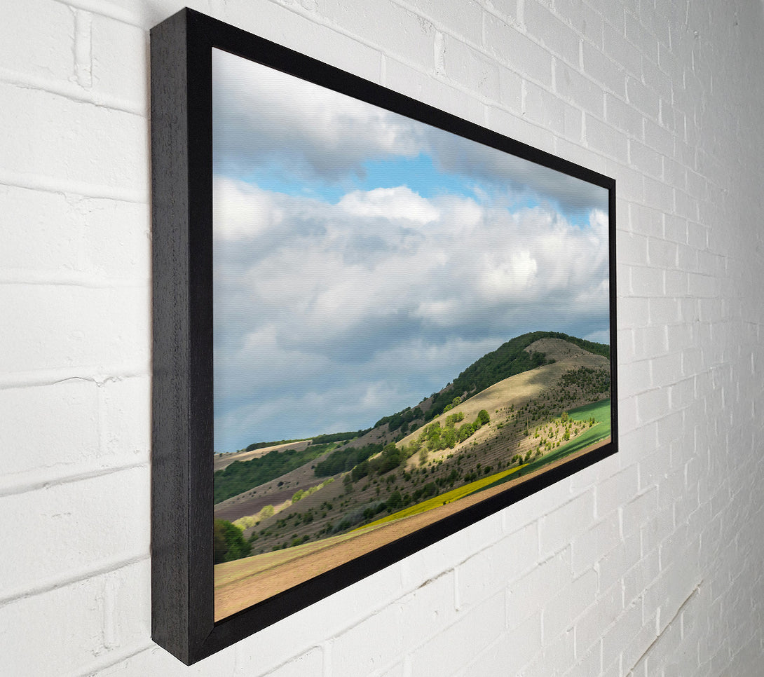  A Canvas Print of Green Hills Under Clouds Canvas Print