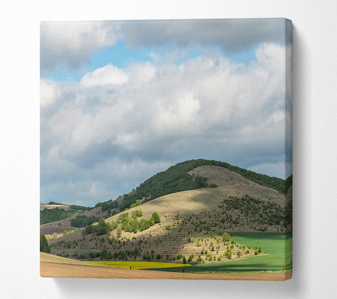  A Canvas Print of Green Hills Under Clouds Canvas Print