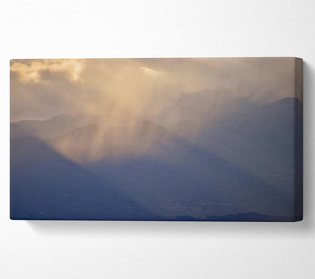 A Canvas Print of Golden Rays Through Mist Canvas Print