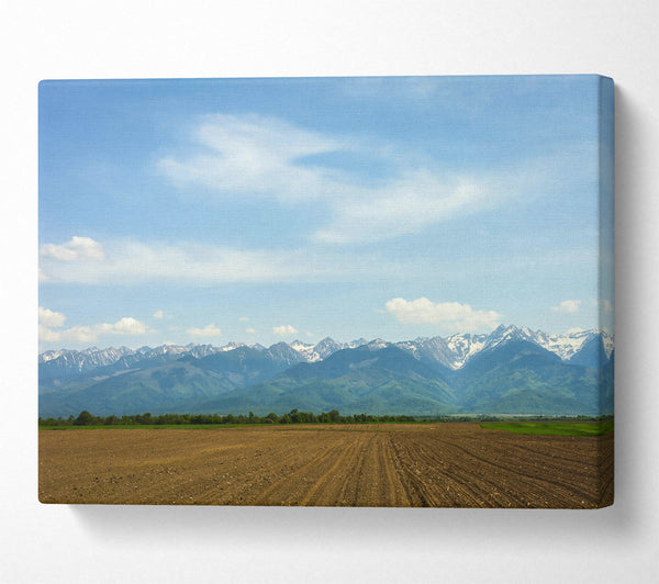 A Canvas Print of Brown Fields And Distant Peaks Canvas Wall Art