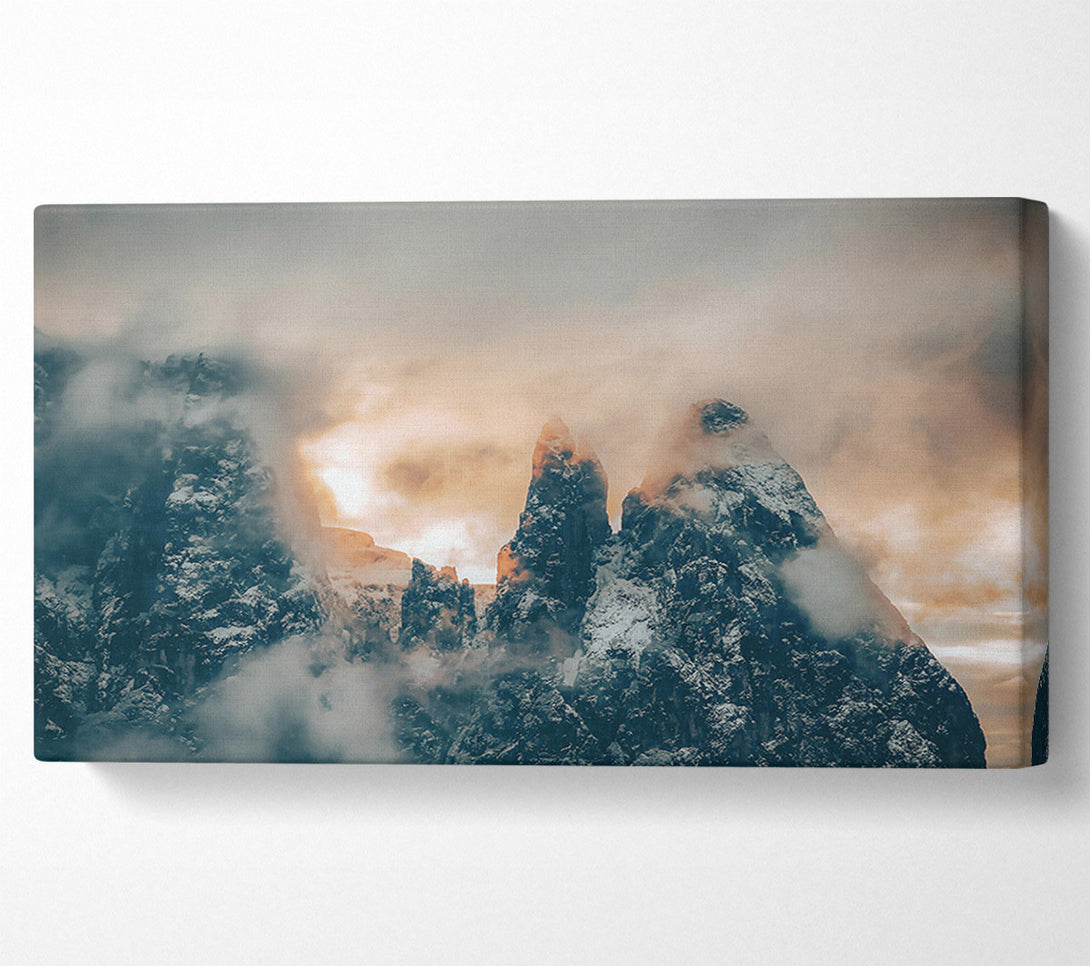  A Canvas Print of Golden Peaks Through Fog Canvas Print