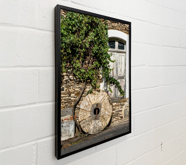 Stone Wheel And Vines