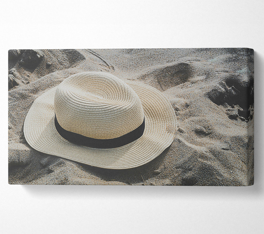  A Canvas Print of Tan Hat On Sand Canvas Print