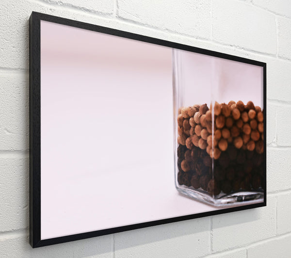 Brown Peppercorns In Glass