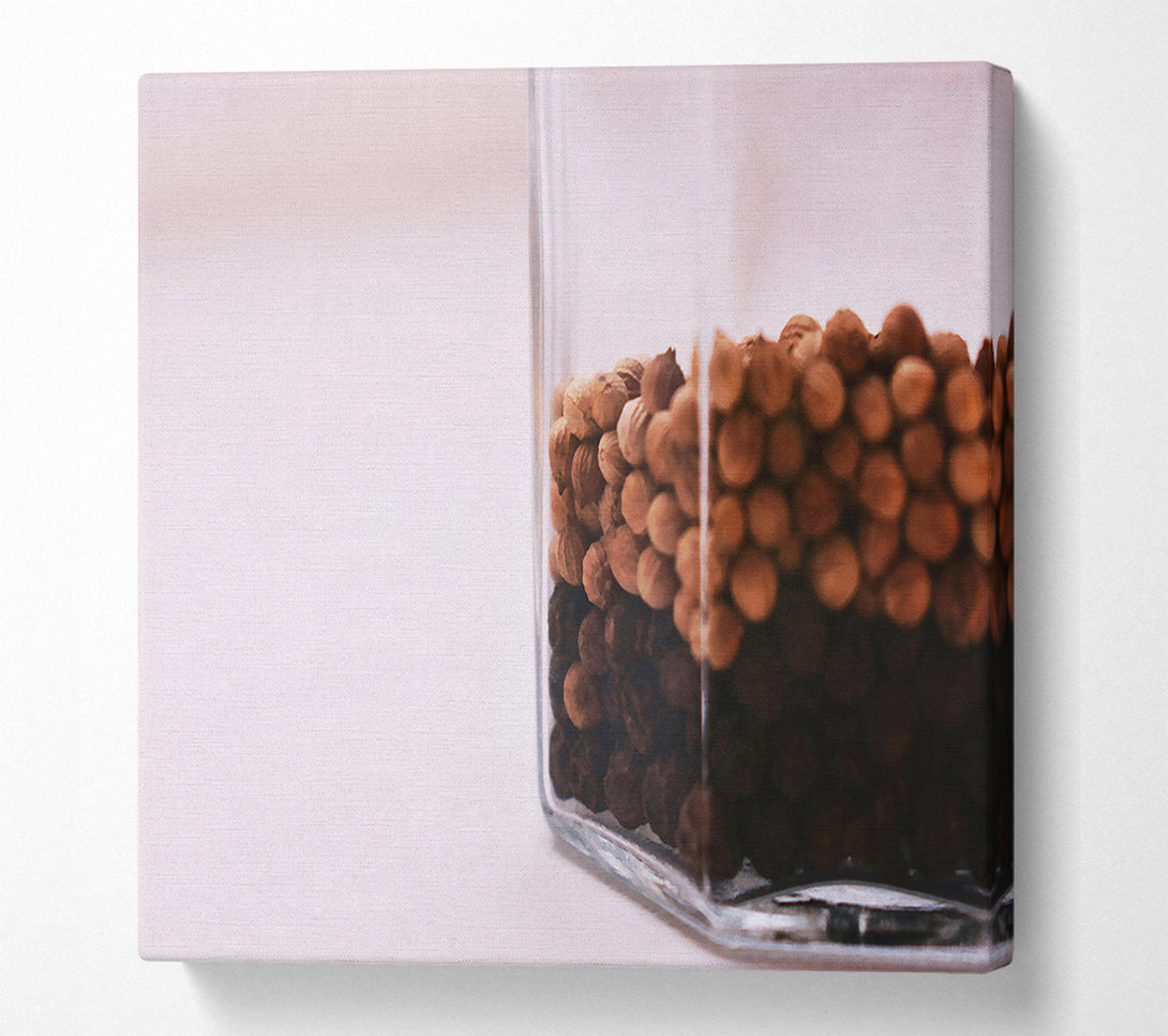  A Canvas Print of Brown Peppercorns In Glass Canvas Art