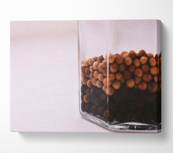 A Canvas Print of Brown Peppercorns In Glass Canvas Art