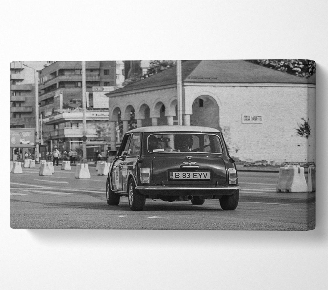 A Canvas Print of Black Mini Cooper On The Road Canvas Print
