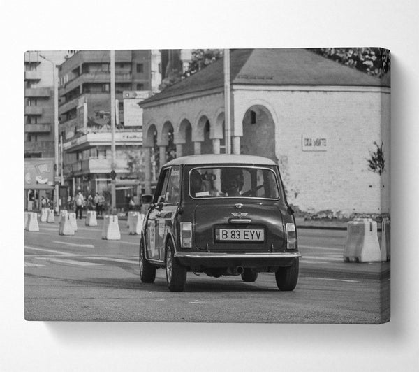  A Canvas Print of Black Mini Cooper On The Road Canvas Print