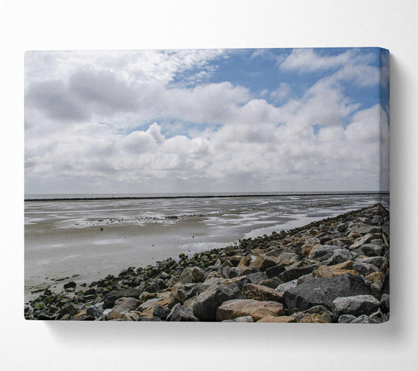  A Canvas Print of Grey Sky, Rocky Shore Canvas Print