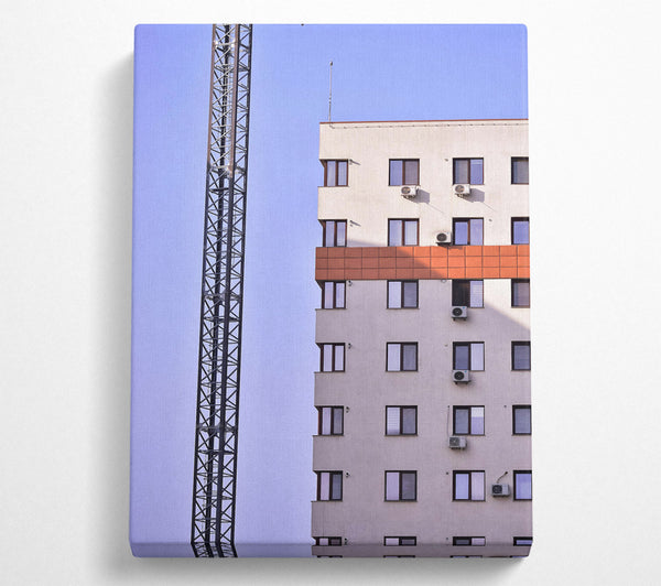  A Canvas Print of White Building And Steel Crane Canvas Art
