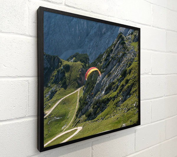 Yellow Paraglider Above Mountains