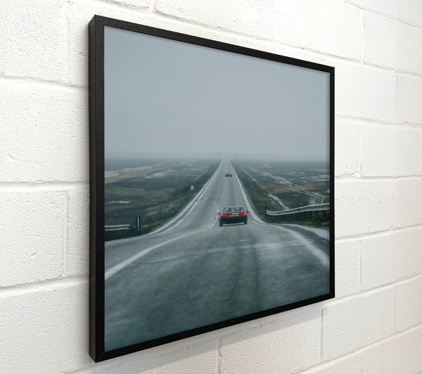 Red Car Through Foggy Road