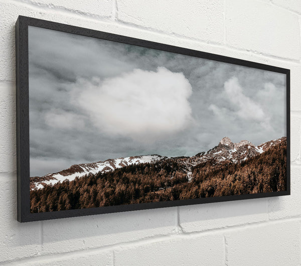 Gray Clouds Over Brown Peaks