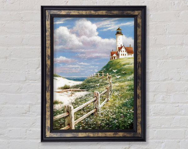 Lighthouse By The Sea Framed Print