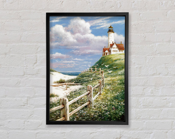 Lighthouse By The Sea Framed Print