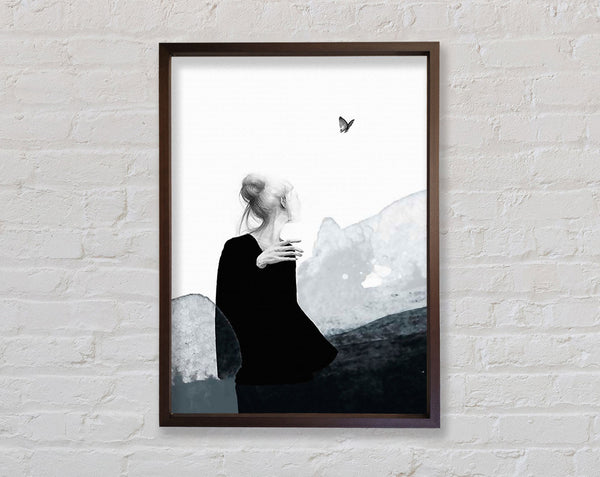 Woman In Walnut Looking At Butterfly Framed Print