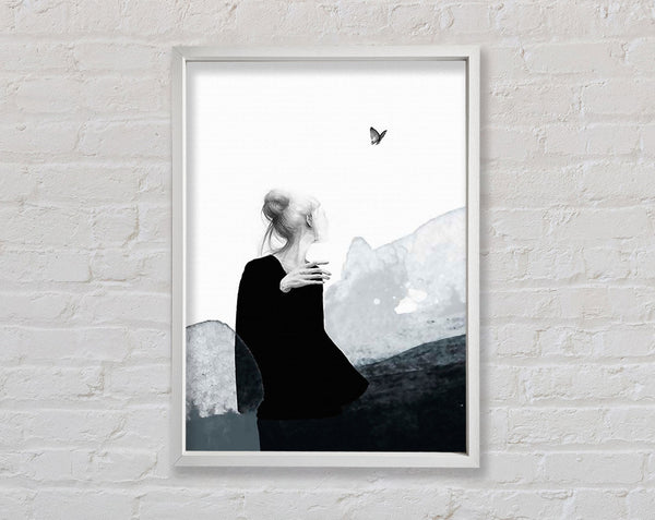 Woman In White Looking At Butterfly Framed Print