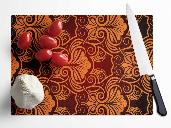 Symmetrical Reds Glass Chopping Board