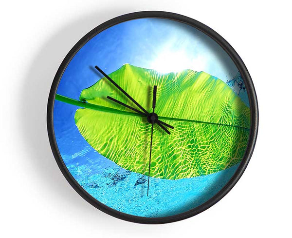 Blue Waters Of A Green Leaf Clock - Wallart-Direct UK