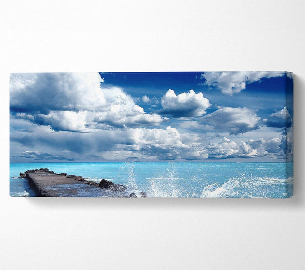 Gentle Waves Crashing In The Cloud Filled Sky