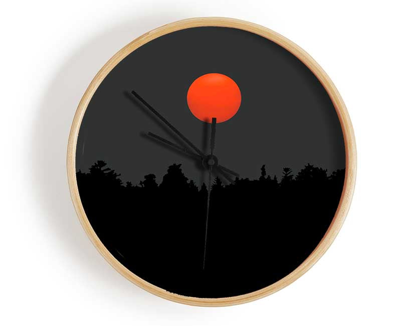 The Red Sun Over The Grey Treeline Clock - Wallart-Direct UK