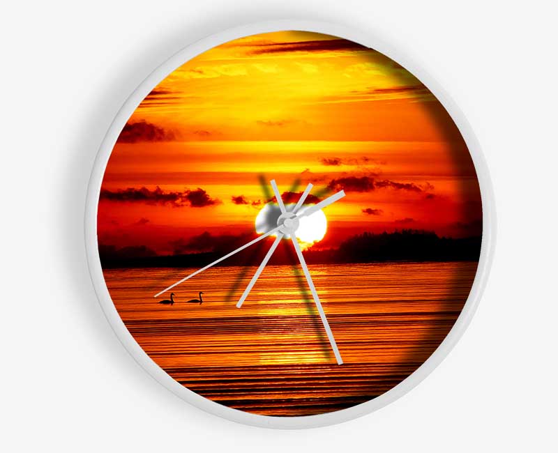 Swans On The Orange Ocean Reflection Clock - Wallart-Direct UK