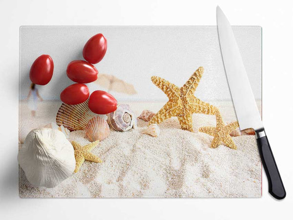 Seashells And Starfish On The Beach Glass Chopping Board