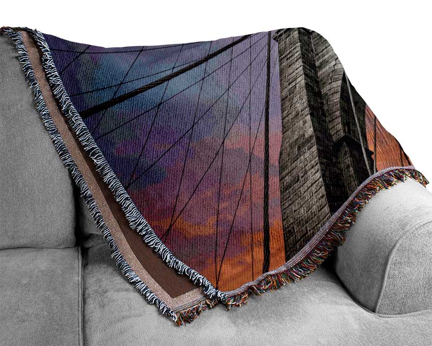 Fire Skies Above Brooklyn Bridge Woven Blanket