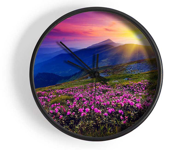 Sunrays Over The Pink Flower Mountain Clock - Wallart-Direct UK