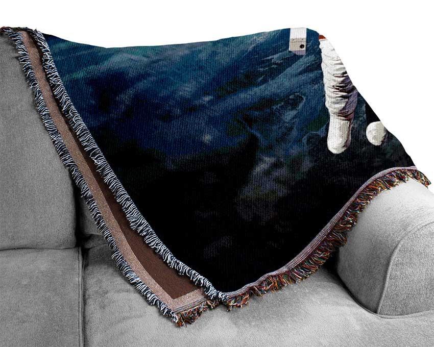 Astronaut Above The Earth Woven Blanket