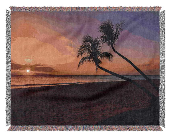 Two palm trees on the beach Woven Blanket